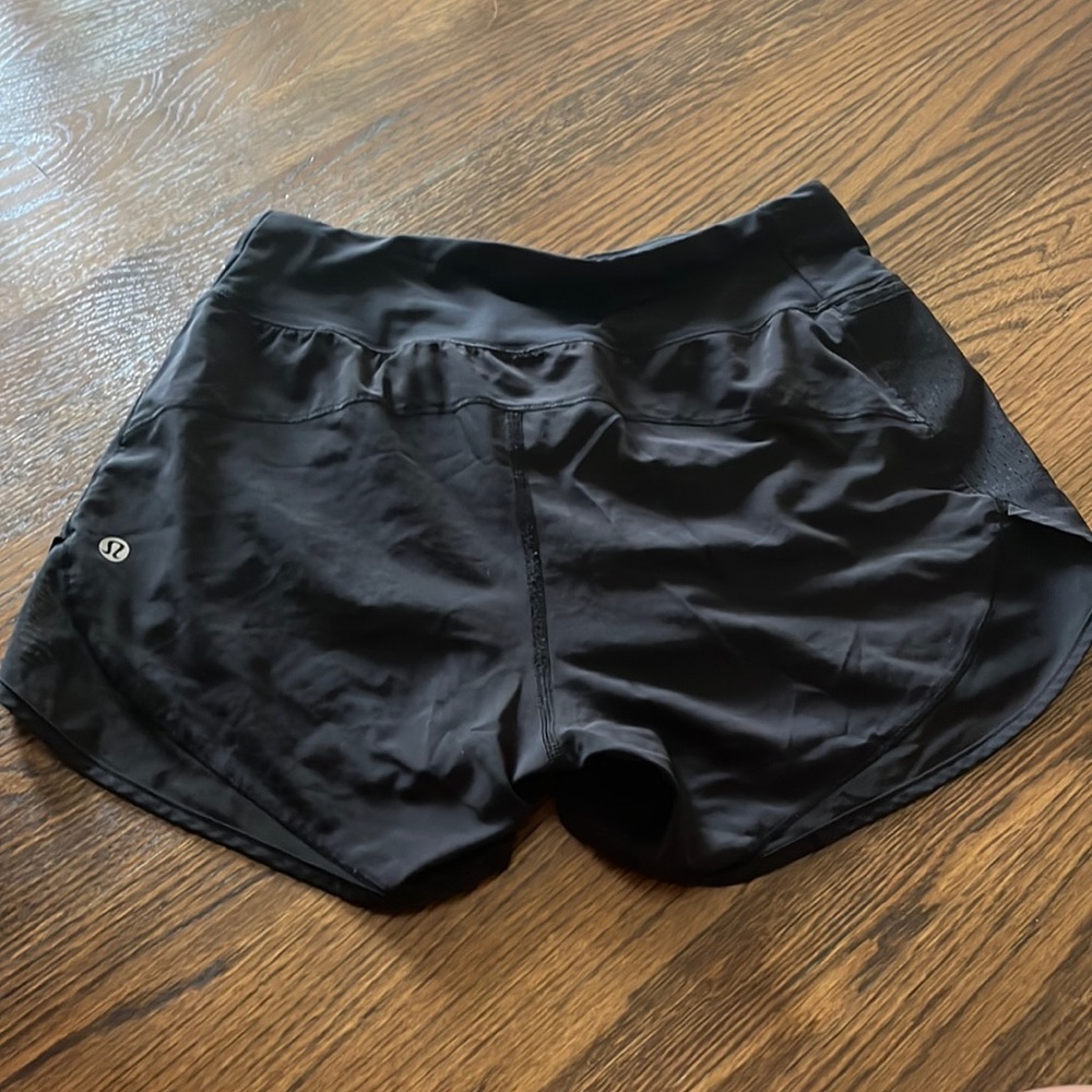 4 inch lululemon black shorts size 4